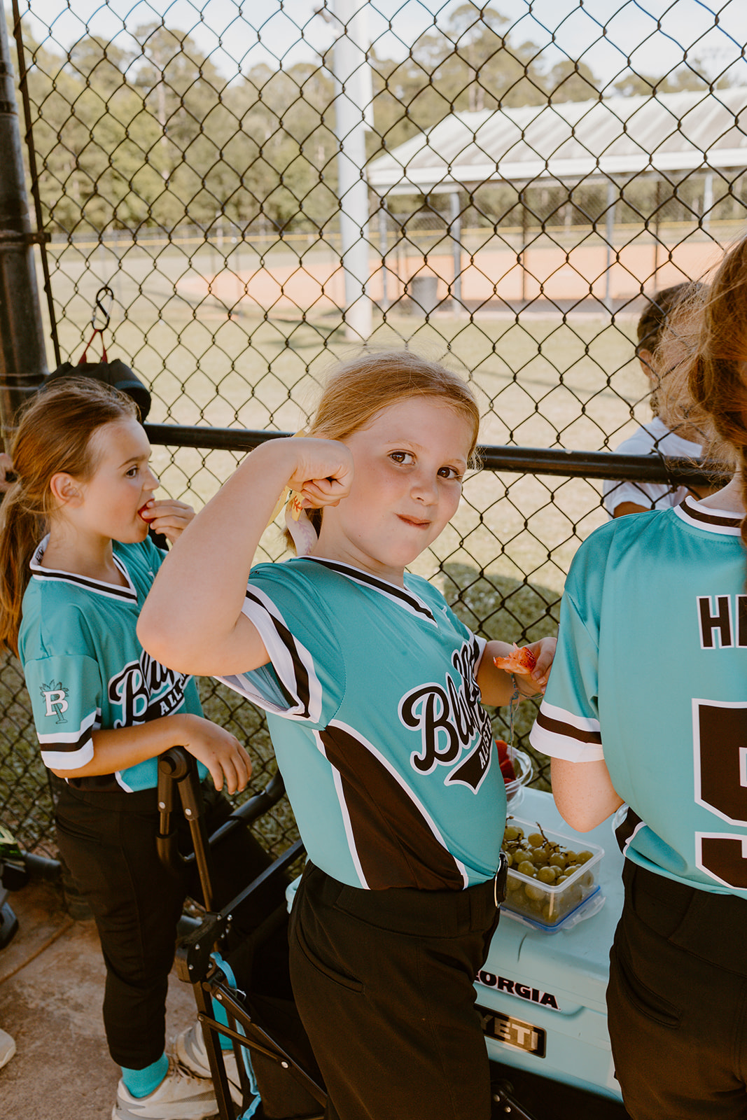 Bluffton All-Star player enjoying a snack between innings